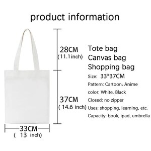 May include: White canvas tote bag, 33 x 37 cm (13 x 14.6 inches), with a 28 cm (11.1 inch) handle. The bag is designed for shopping, learning, and carrying items like books, iPads, and umbrellas. The bag's pattern is cartoon/anime.