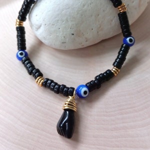 Latino Azabache Bracelet, Mano Negra, Mal De Ojo Azul, Blue Evil Eye, Buena Suerte, Proteccion, Para Bebe, Gold Finish, Slim Black Beaded