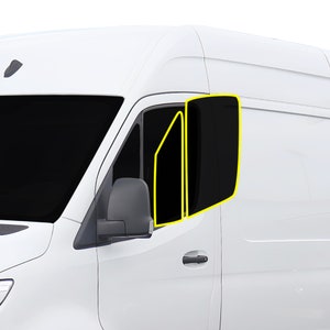 May include: A white van with two tinted windows on the passenger side. The windows are partially open.