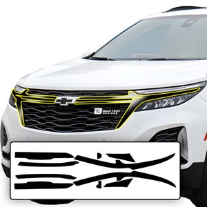 May include: Black and yellow car grille decal set with a stylised design. The decals are designed to fit the front grille of a Chevrolet Traverse.