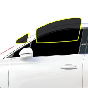 May include: A white car with tinted windows. The front passenger window is partially rolled down, revealing the interior of the car.