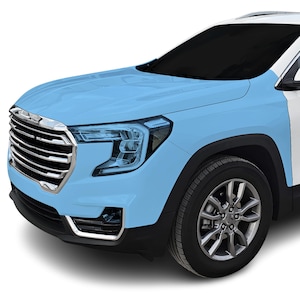 May include: A light blue SUV with a black grille and headlights. The front bumper is black and the wheels are silver.