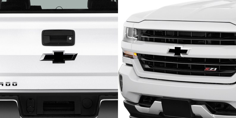 Pu&ograve; includere: Primo piano della parte posteriore e anteriore di un camion bianco. La parte posteriore mostra una maniglia nera e un emblema Chevrolet nero. La parte anteriore mostra l'emblema Chevrolet e un badge Z71 sulla griglia.