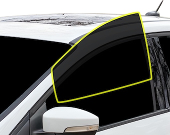 May include: A white car with a tinted window on the driver's side. The window is partially rolled down.