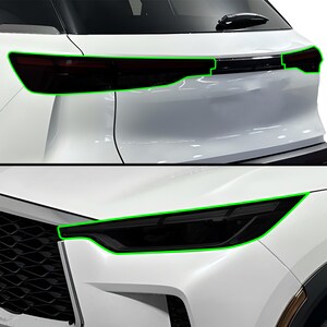 May include: Close-up of a white car's rear and front. The rear features a black taillight assembly and a black trim piece. The front shows a black headlight assembly. The car's body is white.