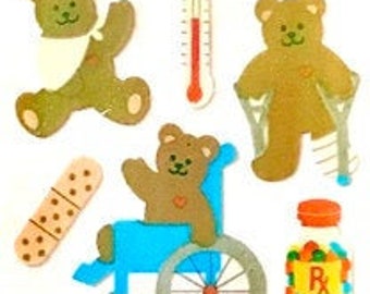 May include: A sheet of stickers featuring cartoon teddy bears with bandages, crutches, thermometers, and medicine bottles. The stickers are designed for children and feature a bright, colorful design. The text "Sandylion Sticker Designs" is at the top of the sheet.