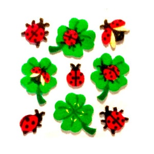 Coccinelles vintage avec 4 autocollants lions des sables flous trèfles 1 carré
