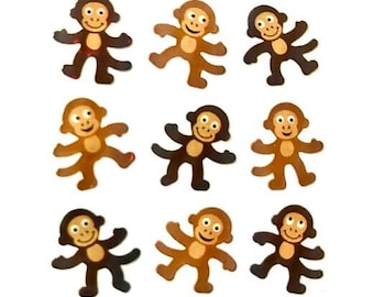 May include: Nine brown and black monkey stickers with smiling faces and outstretched arms and legs.