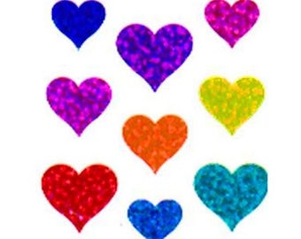 May include: A collection of eight heart-shaped stickers featuring a vibrant, glittery texture. The hearts are displayed in various colors including blue, purple, pink, yellow, orange, red, and teal, arranged in a scattered pattern against a white background.