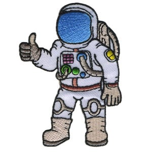 May include: A white astronaut with a blue visor, giving a thumbs up, and colourful details on the suit. The astronaut is wearing a white spacesuit with a red belt and a yellow patch on the shoulder.