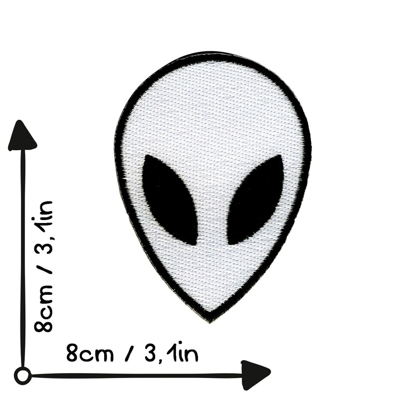 May include: White alien head embroidered patch with black eyes. The patch is 8cm wide and 8cm tall.