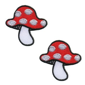 May include: Two red and white mushroom-shaped iron-on patches. The mushrooms have white polka dots on a red background.