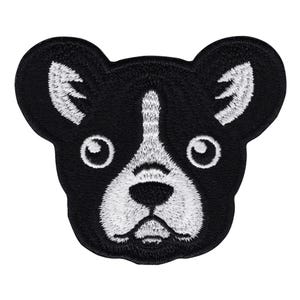 Peut inclure: Patch brodé noir et blanc représentant le visage d'un bouledogue français.