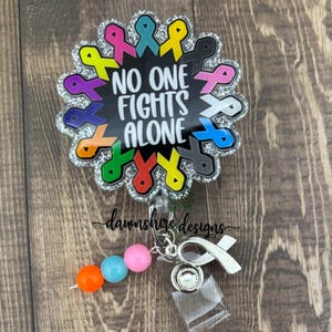 Cancer Awareness Ribbon Badge Reel, no one fights alone badge