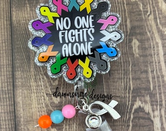 Cancer Awareness Ribbon Badge Reel, no one fights alone badge