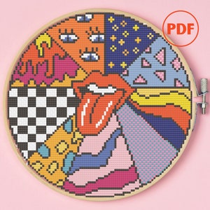 May include: A colorful cross-stitch pattern with a variety of geometric shapes, including stars, hearts, and checkered squares. The pattern also includes a red tongue and a pair of eyes.