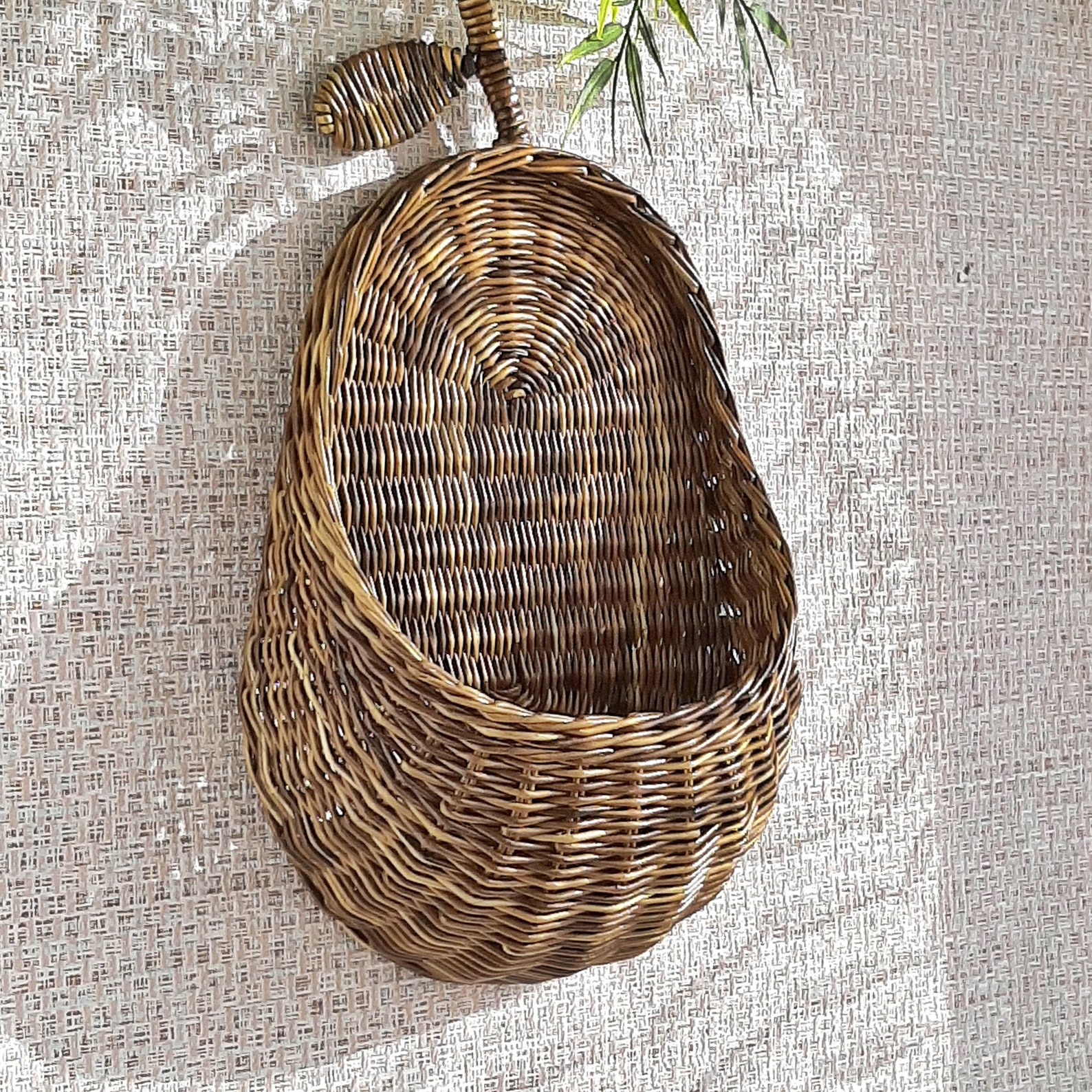 Pearshaped wicker wall basket. Hanging toy storage basket. Etsy