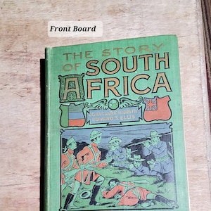 May include: A vintage book titled "The Story of South Africa" with a green cover and gold lettering. The cover features illustrations of soldiers and flags. The book's title and author's names are clearly visible, showcasing its historical theme.