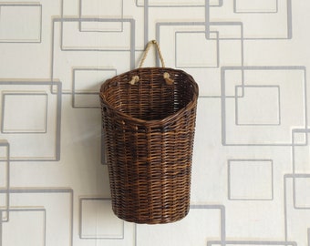Brown wicker front door decor with bow and with white flowers, Wall wicker basket for flowers, Wicker wall Door basket