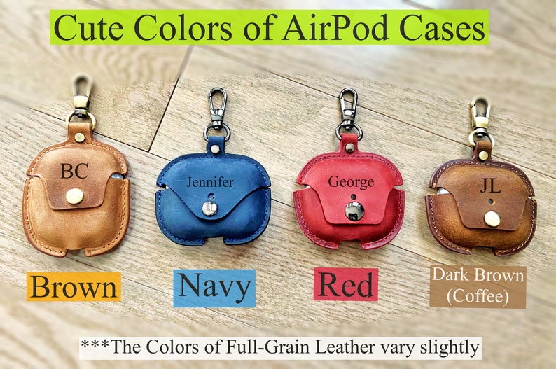 May include: Four leather AirPod cases in brown, navy, red, and dark brown (coffee). Each case has a metal clasp and a personalized name on the front.