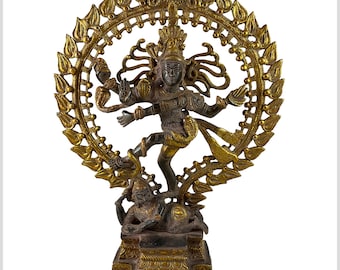 May include: A gold and black metal statue of the Hindu deity Shiva in the Nataraja pose, dancing on a demon. The statue is surrounded by a circular halo with intricate details.