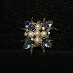 May include: A set of three ceramic mugs with a speckled, matte finish. The mugs are in shades of cream, light gray, and dark gray. Each mug has a simple, minimalist design, perfect for coffee or tea.