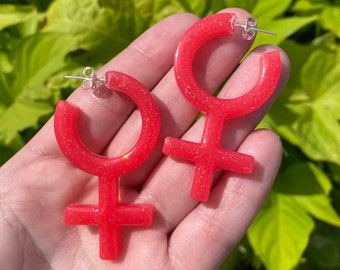 female gender symbol earrings