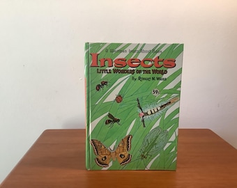 May include: A Whitman Learn About Book titled "Insects: Little Wonders of the World" by Robert N. Werb. The cover features a green background with illustrations of various insects, including a butterfly, a caterpillar, and a dragonfly.