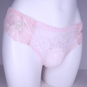 Pink lace panties for crossdressing men. Feminine, no pouch sissy thongs.