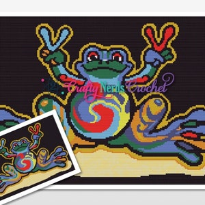 May include: A colorful crochet pattern of a frog with peace signs on its hands. The frog is sitting on a yellow background and has a swirl pattern on its body.