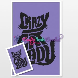 May include: A framed print featuring a black cat silhouette with the words "CRAZY CAT LADY" integrated into the design. The background is a solid lavender color. A smaller print of the same design is also visible.