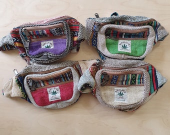 May include: Four hemp fanny packs with colorful woven patterns and the text "Himalayan Hemp THC Free Made in Nepal" on each.