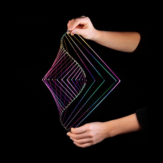 This kinetic art canvas creates soothing designs
