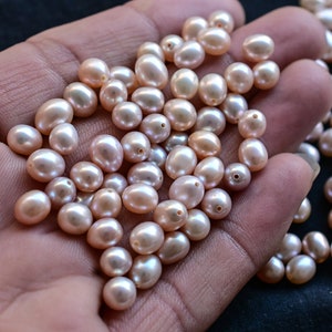 AAA roze perzik zoetwaterparel ovaal ei voor het maken van sieraden, natuurlijke hoge kwaliteit en hoge glans halve boorparel | 9 x 7 tot 7 x 6 mm