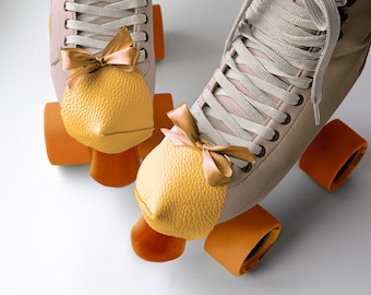 Roller skate toe guards, toe caps, toe covers, roller skates accessories, cute roller skate toe guards  with ribbon, cutest toe caps. Yellow