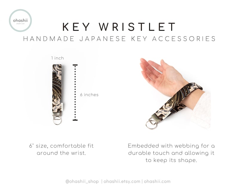 May include: A black and gold key wristlet with a Japanese-inspired pattern. The wristlet is 6 inches long and 1 inch wide. It is made with webbing for a durable touch and to keep its shape.