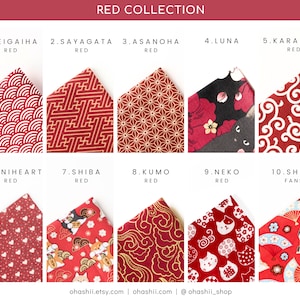 May include: Ten different red fabric designs with Japanese patterns. The designs include a wave pattern, a geometric pattern, a star pattern, a floral pattern, a swirl pattern, a heart pattern, a Shiba Inu dog pattern, a cloud pattern, a cat pattern, and a Shiba Inu dog with a fan pattern.
