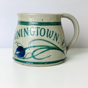 May include: A rustic wooden sign with the text "Welcome to our home" in white lettering. The sign features a distressed finish and a simple, inviting design, perfect for a front porch or entryway.