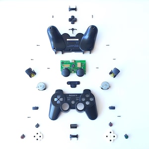 3D-collage van een Playstation-controller