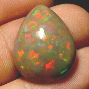 9.80 carat! Brilliant Giant Gem Welo Opal RED GOLD GREEN