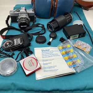 Minolta SRT 101 Eight Piece 35mm Camera Set