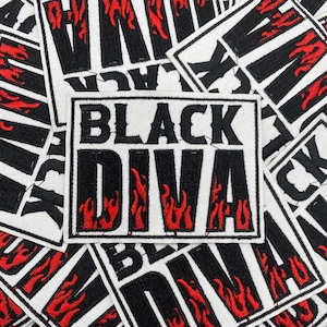 May include: White rectangular patch with the text "BLACK DIVA" in bold black letters. Red flames are beneath the word "DIVA". The background is covered with similar patches with the word "BLACK" and red flames.