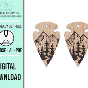 May include: Two laser cut wooden arrowhead ornaments with a mountain and river design. The design is in black and the wood is a light brown color.  SVG - DXF - AI - PDF. DIGITAL DOWNLOAD.
