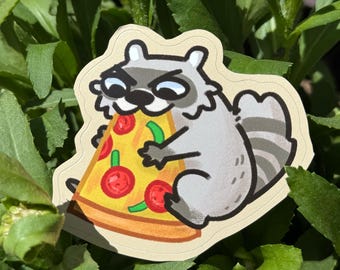 May include: A sticker featuring a cartoon raccoon eating a slice of pizza. The raccoon is gray and white with a black mask and is holding a yellow pizza slice with red tomato toppings.