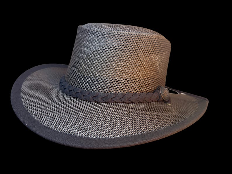 May include: A gray mesh hat with a dark gray braided band and a dark gray brim. The hat has a structured crown and a wide brim. The hat is designed for sun protection and outdoor activities.