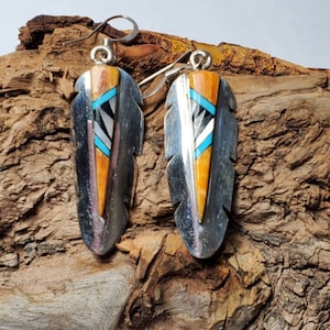 Spiny oyster earrings.  Dangly spiny oyster feather design earrings. Turquoise and spiny oyster earrings.