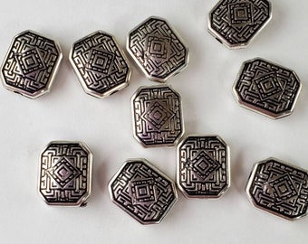 Aztec design beads. Square beads with unique designs.