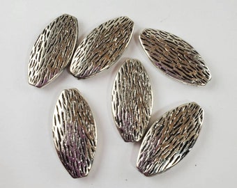Bark looking bead.  Rustic looking bead.  Leaf bead.  Large bead.