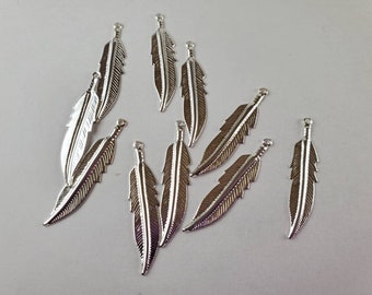 Light weight feather charm!!  Native jewelry design supply.  Southwestern feather design charm.