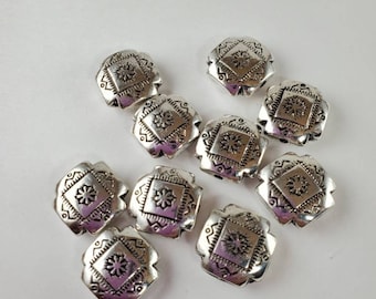Four corner bead.  Native design bead.  Southwestern bead.